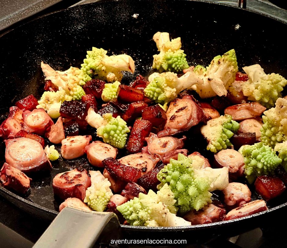 octupus and brocoline on a pan.